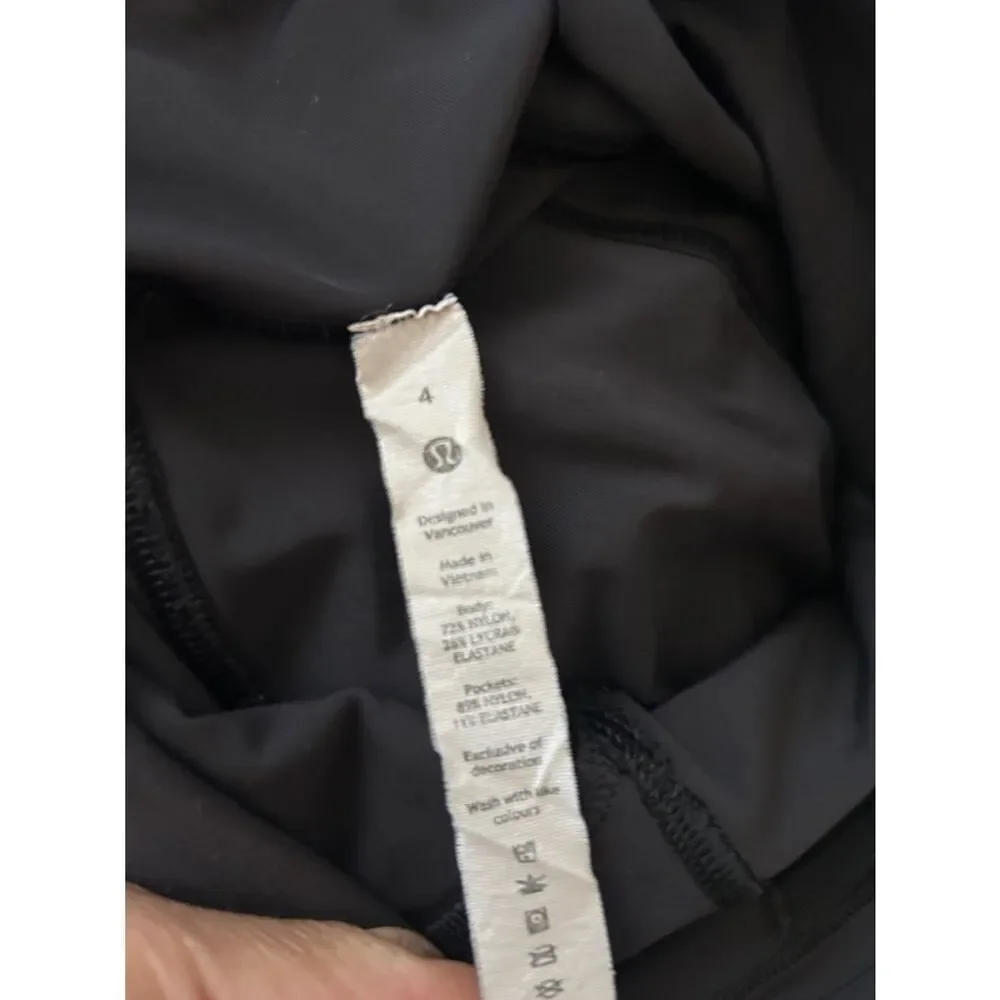 Lululemon Black Active Leggings size 4 good preowned condition no signs of wear